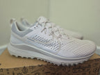 A pair of Nike running shoes in white and light gray, side view.